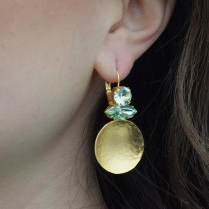 Santorini earrings with crystal – Greek hammered jewelry in 18K gold plated, 18K silver plated, and rose gold plated. Handcrafted earrings with hammered discs and sparkling crystals inspired by the island of Santorini.