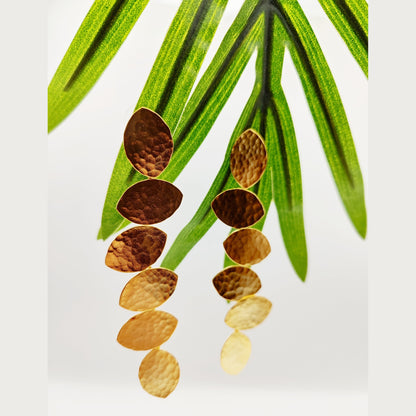Trifyllon Earrings – Greek Hammered Jewelry – Available in 18K Gold, Silver, and Rose Gold Plated. Cascading hammered leaf design inspired by ancient Greek nature symbolism.