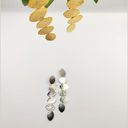 Trifyllon Earrings – Greek Hammered Jewelry – Available in 18K Gold, Silver, and Rose Gold Plated. Cascading hammered leaf design inspired by ancient Greek nature symbolism.