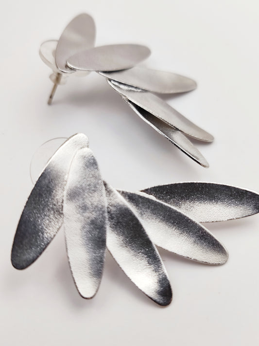 Angelos earrings – Greek hammered jewelry in 18K gold plated, 18K silver plated, and rose gold plated. Handcrafted hammered wing-inspired design.