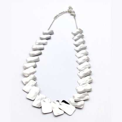 Handmade hammered necklace with rectangular gold-plated plates inspired by the poetic elegance of gold in ancient Greek culture.