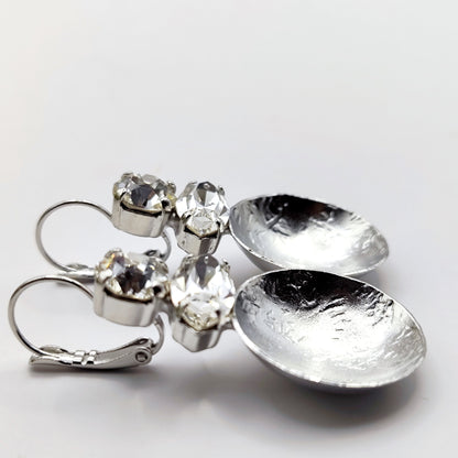 Santorini earrings with crystal – Greek hammered jewelry in 18K gold plated, 18K silver plated, and rose gold plated. Handcrafted earrings with hammered discs and sparkling crystals inspired by the island of Santorini.