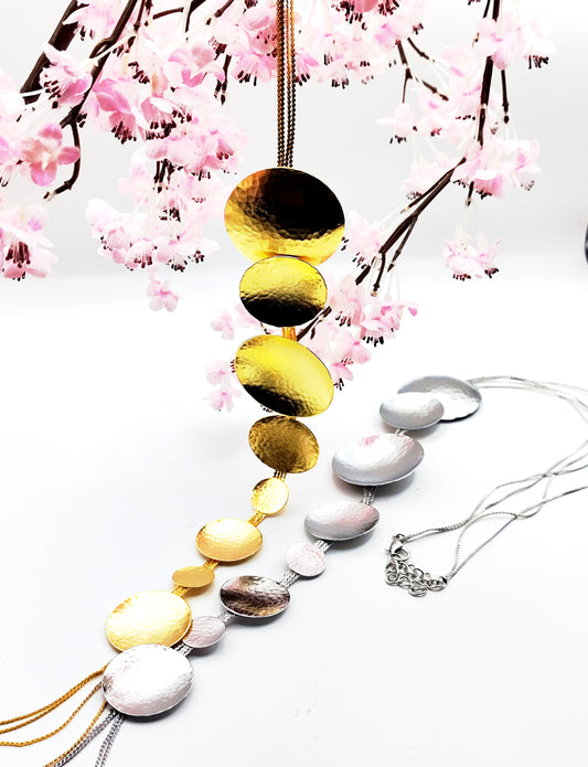 Rhea necklace – Greek hammered jewelry in 18K gold plated, 18K silver plated, and rose gold plated. Handcrafted necklace with hammered circular discs symbolizing the eternal cycle of life.