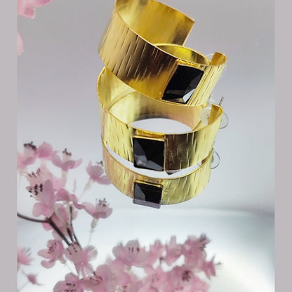  Inspired by Ionian columns and sea. 18K gold, silver, crystals