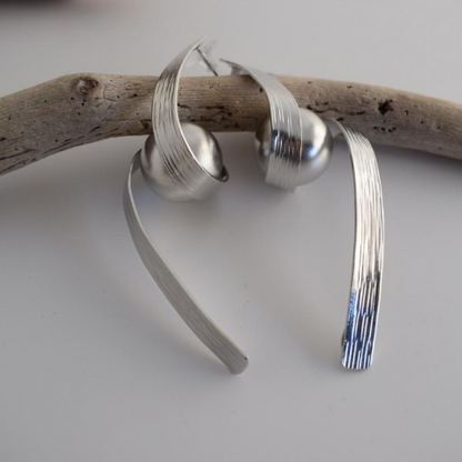 Kronos earrings – Greek hammered jewelry – 18K gold or silver plated – sculptural curved design with central sphere – also available in rose gold