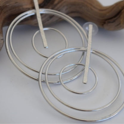 Handmade 18k gold plated triple spiral hoop earrings with vertical hammered bar, inspired by the cosmos and ancient Greek design