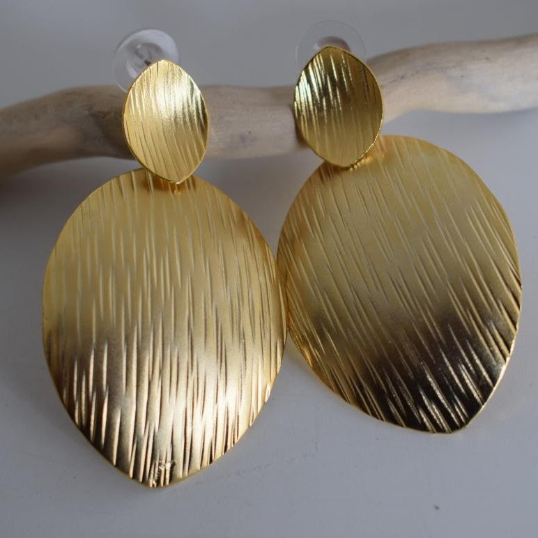 Anemone2 earrings in handmade Greek hammered jewelry design, available in gold plated and silver plated finishes.