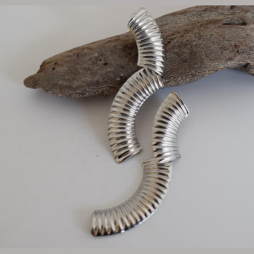 Skiron earrings in handmade Greek hammered jewelry design, available in gold plated and silver plated finishes.