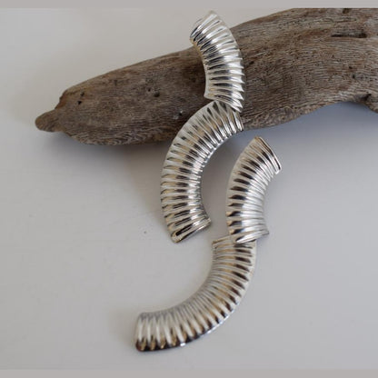 Skiron earrings in handmade Greek hammered jewelry design, available in gold plated and silver plated finishes.
