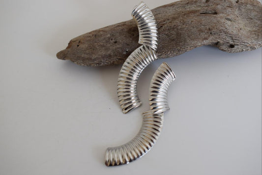 Skiron earrings in handmade Greek hammered jewelry design, available in gold plated and silver plated finishes.