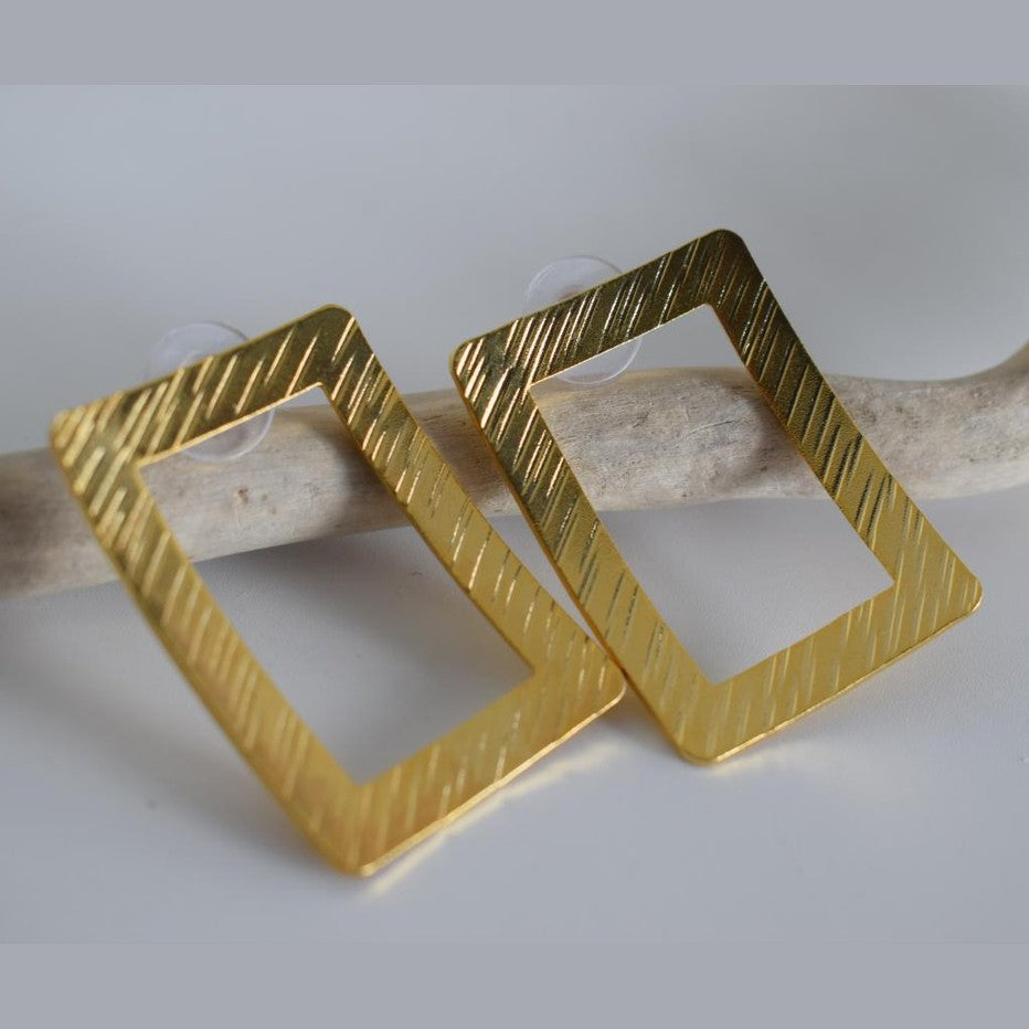 Danae2 earrings in handmade Greek hammered jewelry design, available in gold plated and silver plated finishes.