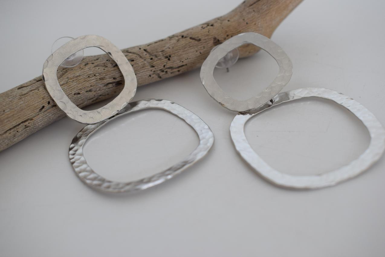 Aegis earrings in handmade Greek hammered jewelry design, available in gold plated and silver plated finishes.