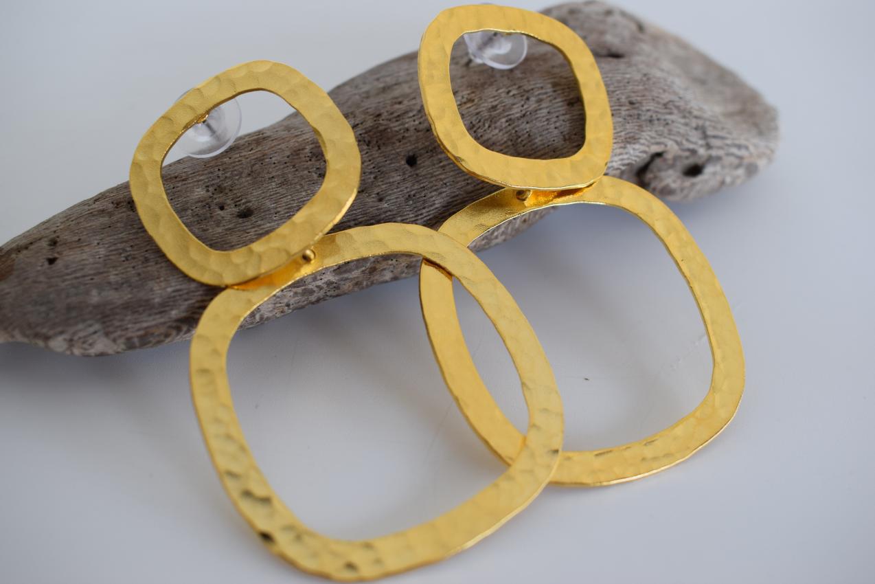Aegis earrings in handmade Greek hammered jewelry design, available in gold plated and silver plated finishes.