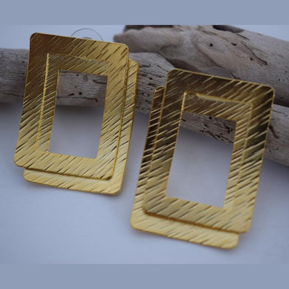 Danae3 earrings in handmade Greek hammered jewelry design, available in gold plated and silver plated finishes.