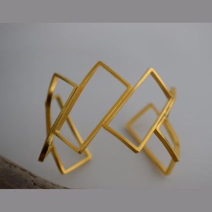 Geometria 3 bracelet Greek hammered jewelry available in 18K gold plated, 18K silver plated and rose gold plated openwork geometric design