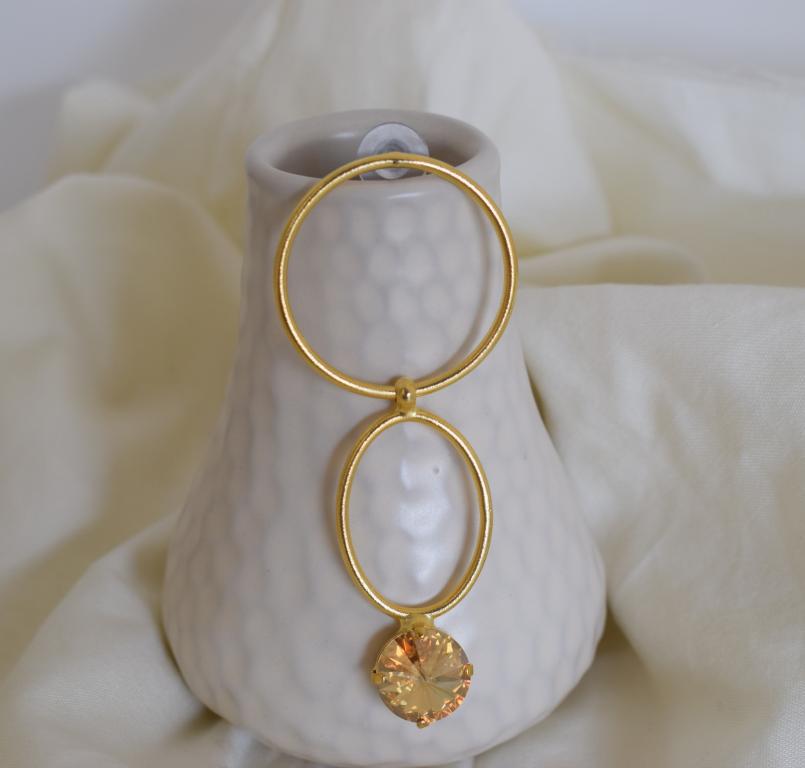 Kyklos earrings in handmade Greek hammered jewelry design with fine crystals, available in gold plated and silver plated finishes.