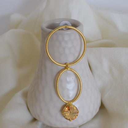 Kyklos earrings in handmade Greek hammered jewelry design with fine crystals, available in gold plated and silver plated finishes.