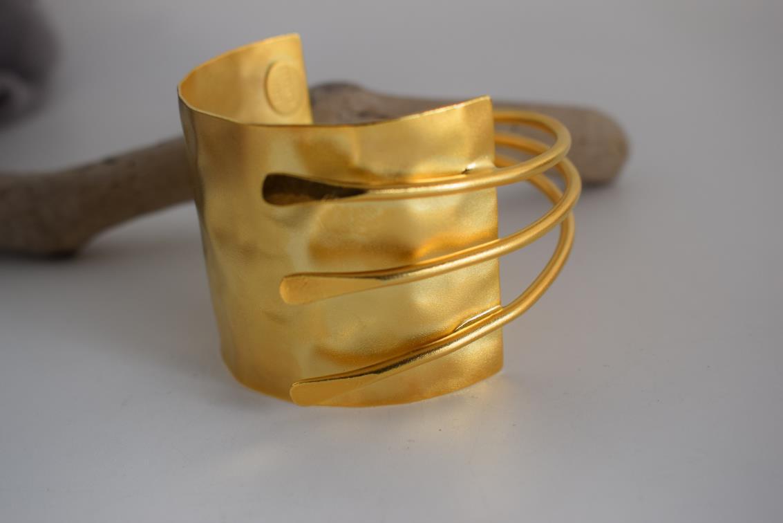 Mycenae bracelet – Greek hammered jewelry with layered cuff design, inspired by Mycenaean treasures, available in 18K gold-plated, 18K silver-plated, and rose-gold plated finishes.