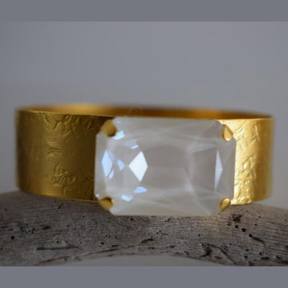 Okeanos bracelet Greek hammered jewelry with emerald-cut crystal in 18K gold, silver, and rose gold plated finish.