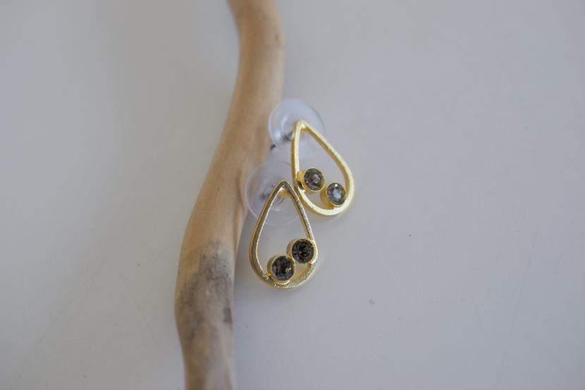 Tinos earrings in Greek hammered teardrop design with fine crystals, available in 18K gold plated and 18K silver plated finishes.