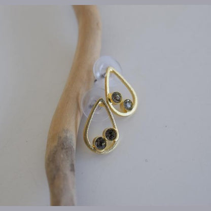 Tinos earrings in Greek hammered teardrop design with fine crystals, available in 18K gold plated and 18K silver plated finishes.