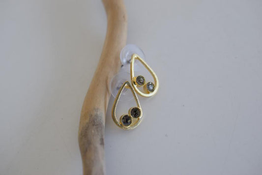 Tinos earrings in Greek hammered teardrop design with fine crystals, available in 18K gold plated and 18K silver plated finishes.