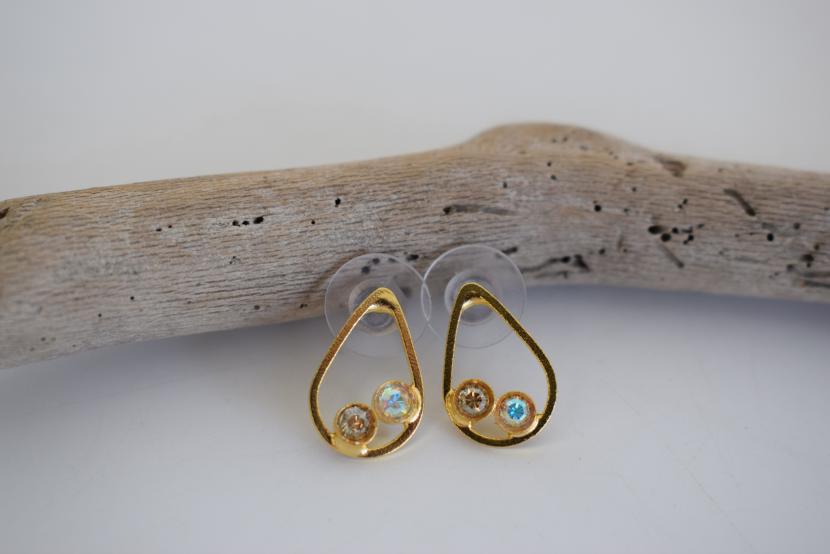 Tinos earrings in Greek hammered teardrop design with fine crystals, available in 18K gold plated and 18K silver plated finishes.