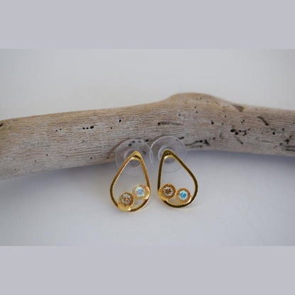 Tinos earrings in Greek hammered teardrop design with fine crystals, available in 18K gold plated and 18K silver plated finishes.