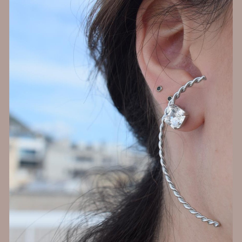 Okeanos earrings in Greek hammered twisted hoop design with fine crystals, available in 18K gold plated and 18K silver plated finishes.