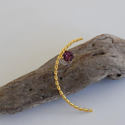 Okeanos earrings in Greek hammered twisted hoop design with fine crystals, available in 18K gold plated and 18K silver plated finishes.