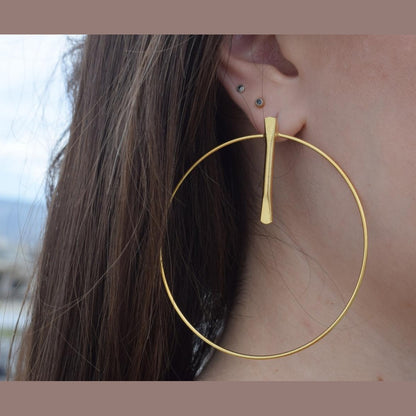 Elysia earrings in Greek hammered hoop design, available in 18K gold plated and 18K silver plated finishes.