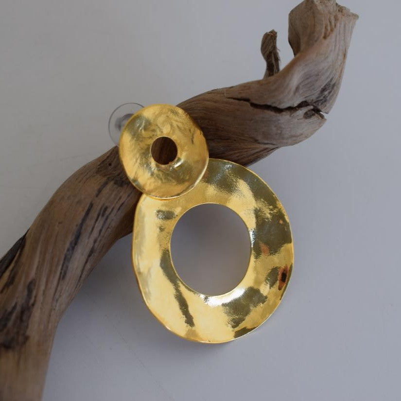Labrys handmade Greek hammered earrings shown in gold plated finish and available in gold and silver plated options.