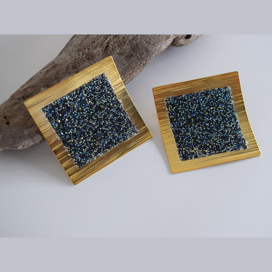 Thyra handmade Greek hammered earrings with fine crystals, available in gold plated and silver plated.