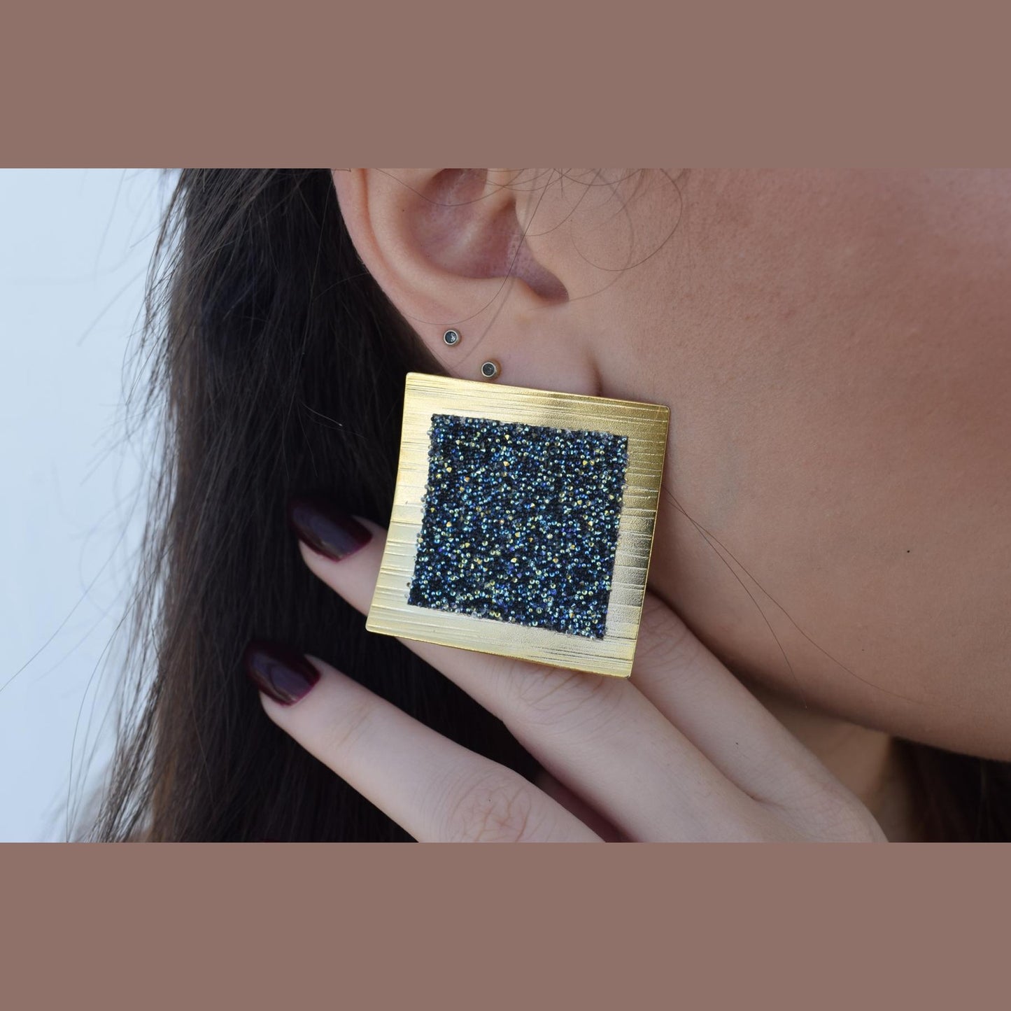 Thyra handmade Greek hammered earrings with fine crystals, available in gold plated and silver plated.