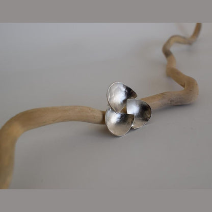 Hydor handmade Greek hammered earrings with layered organic forms, available in gold plated and silver plated.