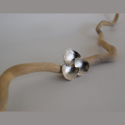 Hydor handmade Greek hammered earrings with layered organic forms, available in gold plated and silver plated.