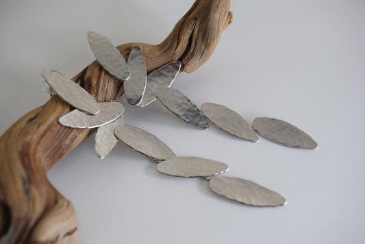 Nike2 handmade Greek hammered long drop earrings with wing-inspired forms, available in gold plated and silver plated.