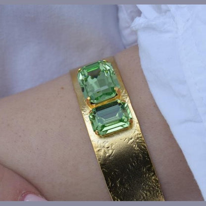Electra bracelet – Greek hammered jewelry cuff with emerald-cut crystals, inspired by the radiant heroine Electra, available in 18K gold-plated, 18K silver-plated, and rose-gold plated finishes.