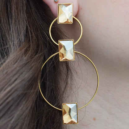 Ionio earrings with crystal – Greek hammered jewelry with hoops and faceted stones, inspired by the Ionian Sea, available in 18K gold-plated, 18K silver-plated, and rose-gold plated finishes.