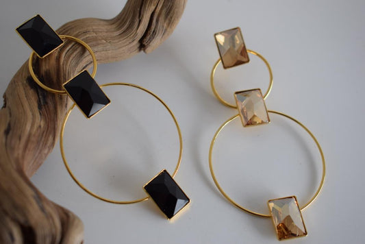 Ionio earrings with crystal – Greek hammered jewelry with hoops and faceted stones, inspired by the Ionian Sea, available in 18K gold-plated, 18K silver-plated, and rose-gold plated finishes.