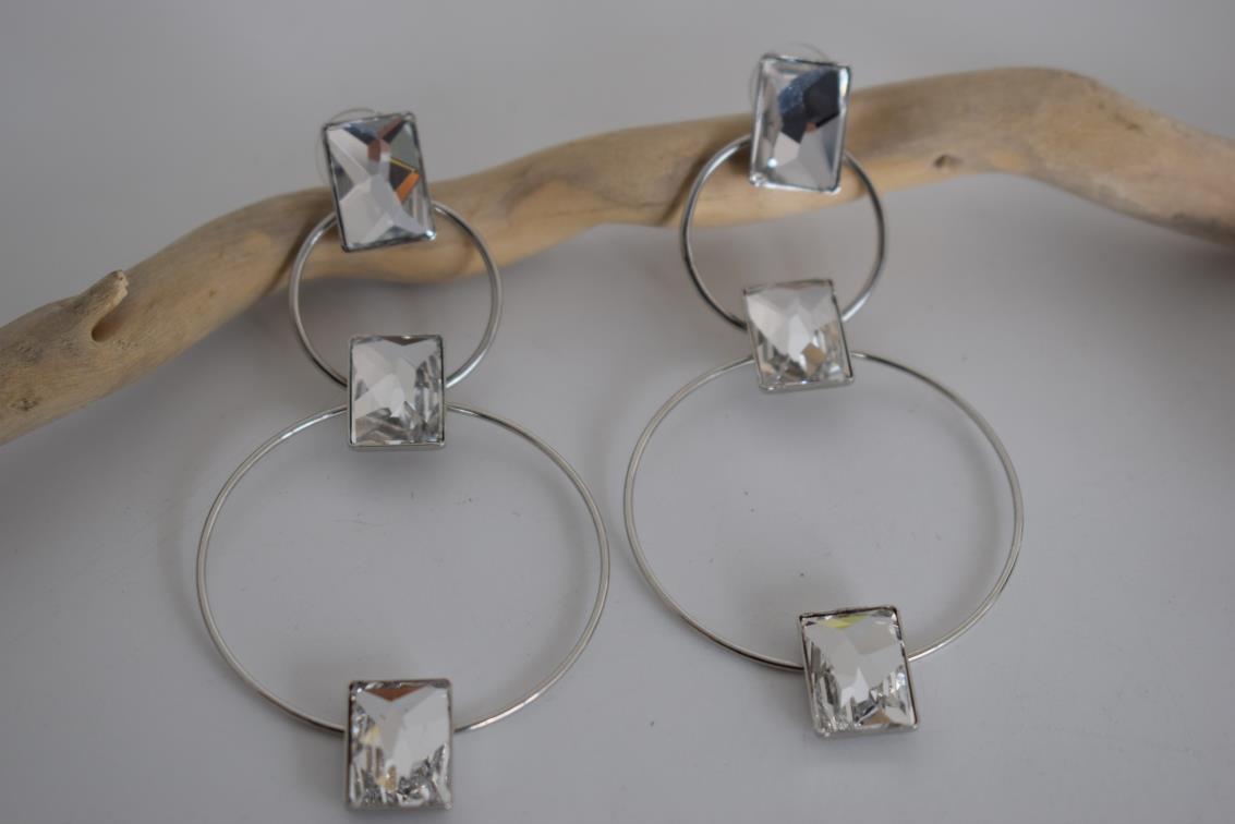 Ionio earrings with crystal – Greek hammered jewelry with hoops and faceted stones, inspired by the Ionian Sea, available in 18K gold-plated, 18K silver-plated, and rose-gold plated finishes.