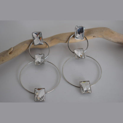 Ionio earrings with crystal – Greek hammered jewelry with hoops and faceted stones, inspired by the Ionian Sea, available in 18K gold-plated, 18K silver-plated, and rose-gold plated finishes.