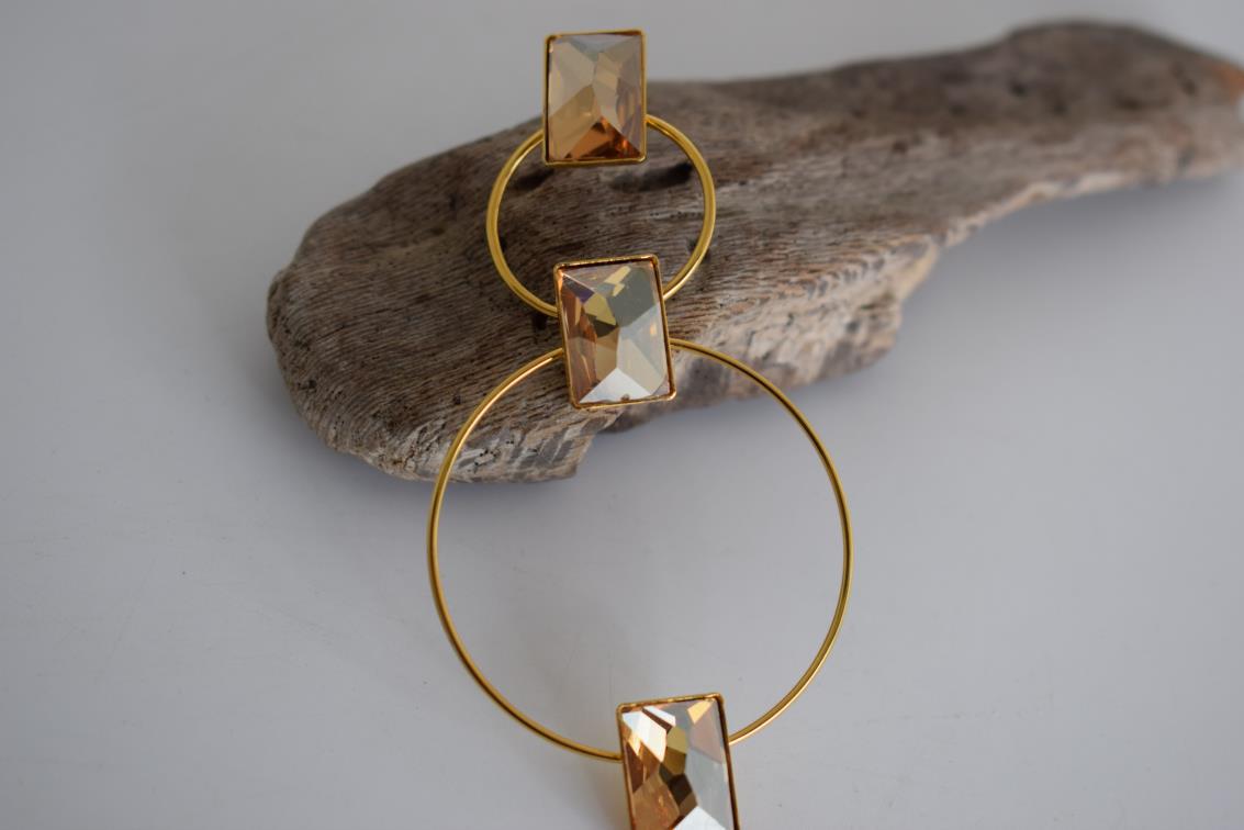 Ionio earrings with crystal – Greek hammered jewelry with hoops and faceted stones, inspired by the Ionian Sea, available in 18K gold-plated, 18K silver-plated, and rose-gold plated finishes.