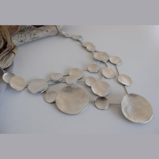 Mycenae necklace with hammered disc design inspired by Mycenaean gold treasures. Greek hammered jewelry in 18K gold, silver, or rose gold plating.