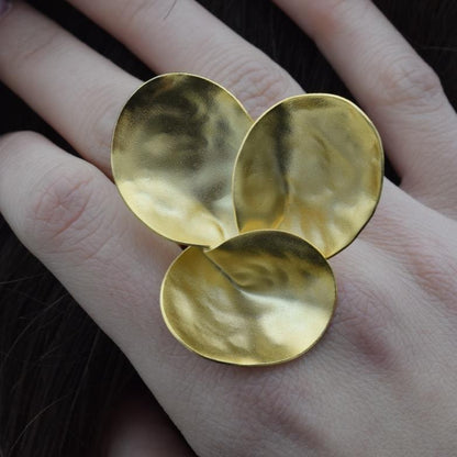 Amphitrite ring Greek hammered jewelry in 18K gold, silver, and rose gold plated finish.