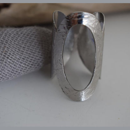 Aegis ring Greek hammered jewelry with bold open oval design, available in gold, silver, and rose gold plated.