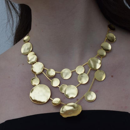 Mycenae necklace with hammered disc design inspired by Mycenaean gold treasures. Greek hammered jewelry in 18K gold, silver, or rose gold plating.
