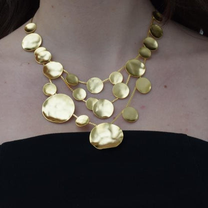 Mycenae necklace with hammered disc design inspired by Mycenaean gold treasures. Greek hammered jewelry in 18K gold, silver, or rose gold plating.