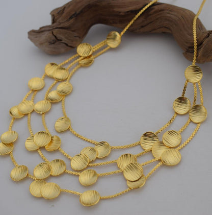 Kypros2 Necklace – Handmade Greek hammered jewelry with layered hammered disc design, available in 18K gold and silver plated.