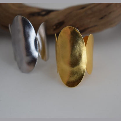 Delos ring Greek hammered jewelry with oval double-disc design, available in gold, silver, and rose gold plated.